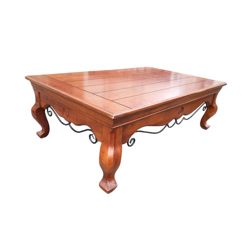 349 - A LARGE MAHOGANY COFFEE TABLE WITH METALWORK TRIM