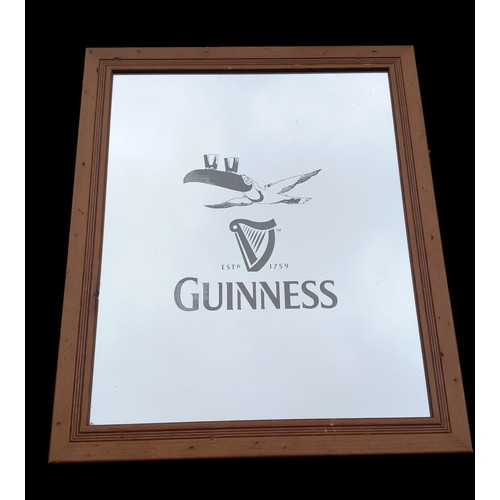 352 - GUINESS TUCAN MIRROR 23X19