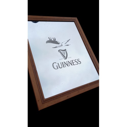 352 - GUINESS TUCAN MIRROR 23X19