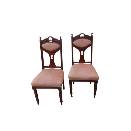 365 - PAIR OF VICTORIAN CHAIRS ON CASTORS