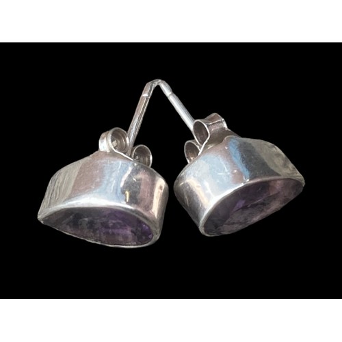 406 - A STUNNING PAIR OF PEAR CUT SILVER AMETHYST EARRINGS