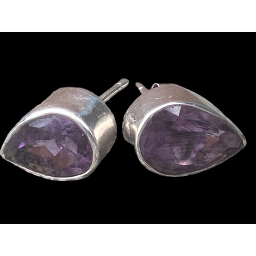 406 - A STUNNING PAIR OF PEAR CUT SILVER AMETHYST EARRINGS