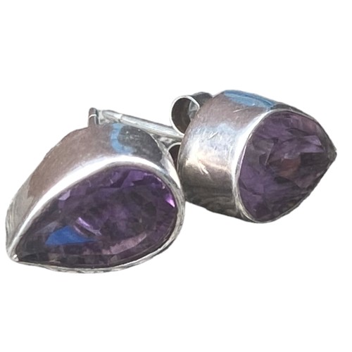 406 - A STUNNING PAIR OF PEAR CUT SILVER AMETHYST EARRINGS