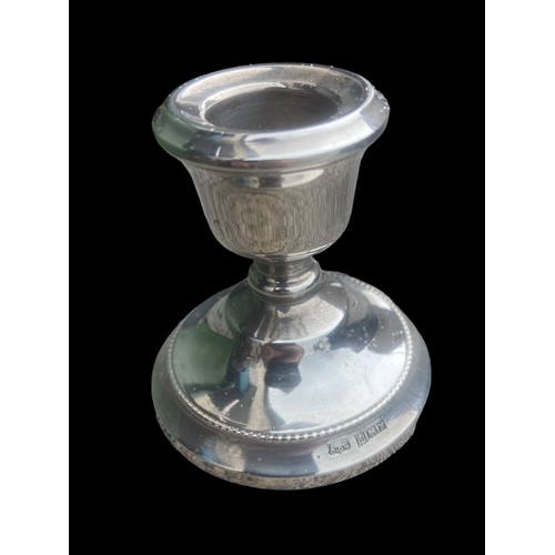 408 - A SHORT BIRMINGHAM SILVER CANDLESTICK weighted total weight is 83.65grm