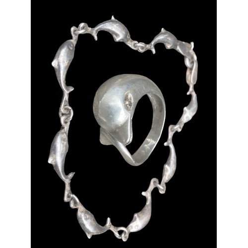 409 - A SILVER DOLPHIN BRACELET & A SILVER DOLPHIN RING