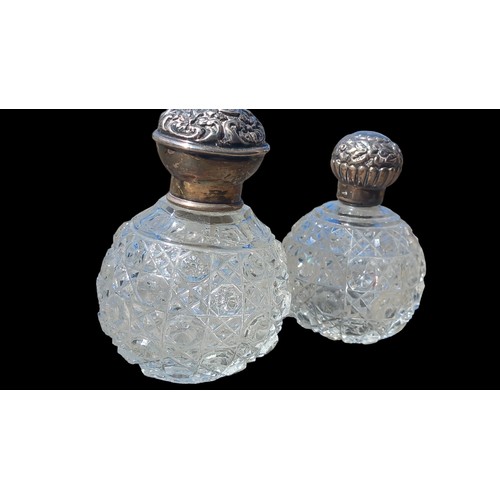 430 - 2 SILVER TOPPED GLASS PERFUME BOTTLES