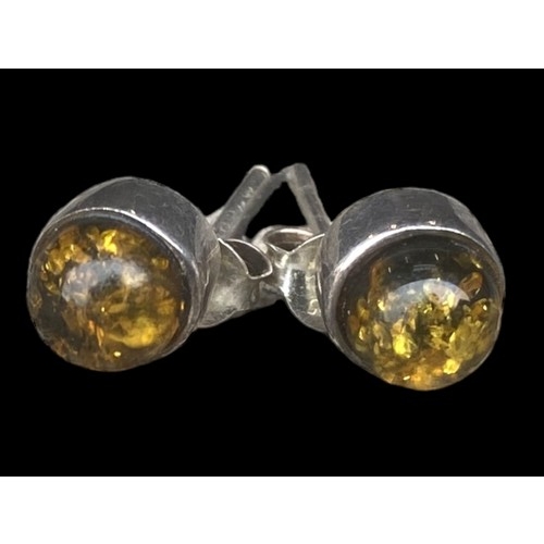 434 - A PAIR OF SILVER AMBER SET EARRINGS