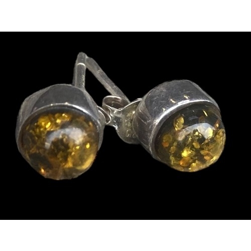 434 - A PAIR OF SILVER AMBER SET EARRINGS