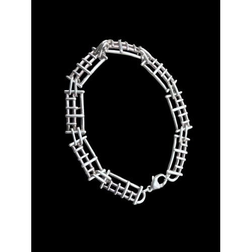 435 - A SILVER DESIGNER BRACELET