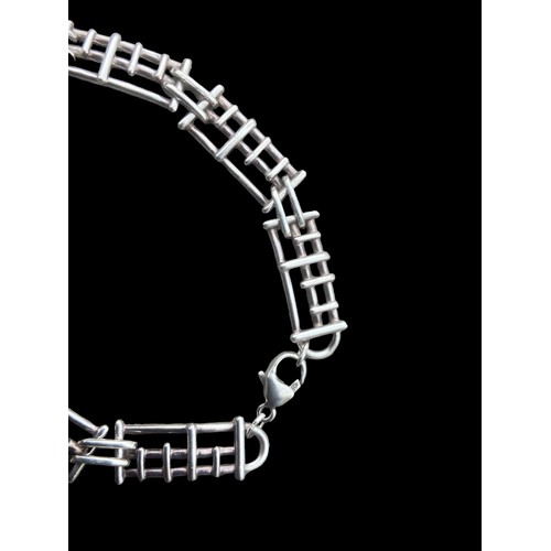 435 - A SILVER DESIGNER BRACELET