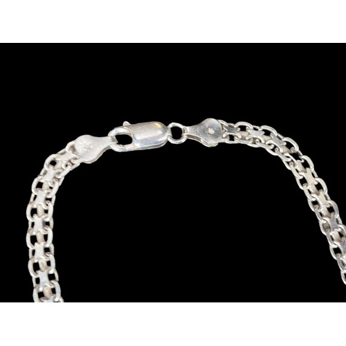 437 - A LONG HEAVY SILVER FLATLINK CHAIN WITH T.BAR 13.85 grm and 17