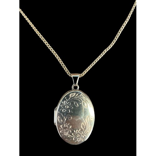 502 - A 9ct FULLY HALLMARKED FLORAL DESIGN LOCKET ON 9ct  GOLD CHAIN 5.26grm