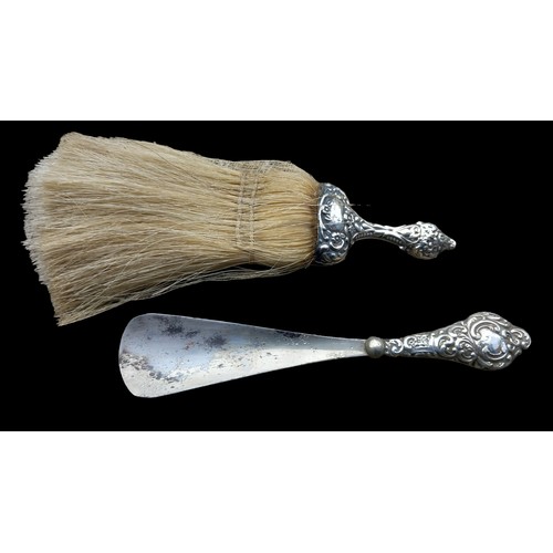 506 - A CHESTER SILVER SHOE HORN AND SILVER TABLE TOP BRUSH