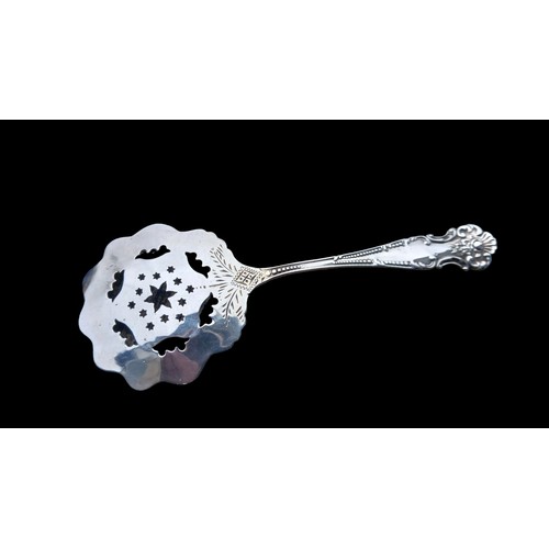 511 - A STERLING SILVER SEIVE SPOON 15.84gms