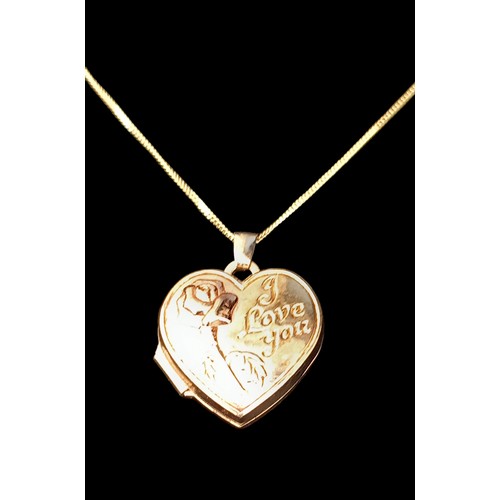 516 - A BEAUTIFUL 9CT I LOVE YOU HEART LOCKET ON A 9CT CHAIN 1.68grm