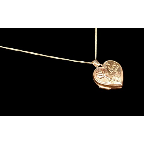 516 - A BEAUTIFUL 9CT I LOVE YOU HEART LOCKET ON A 9CT CHAIN 1.68grm