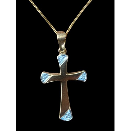 526 - A SHAPED 9CT GOLD CROSS ON A 9CT GOLD CHAIN