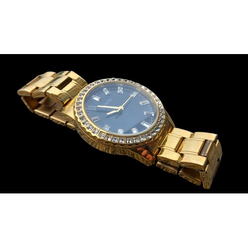 538 - 2 WATCHES ...ONE FOSSIL BRAND STAINLESS STEEL....ONE GUESS GOLD PLATED