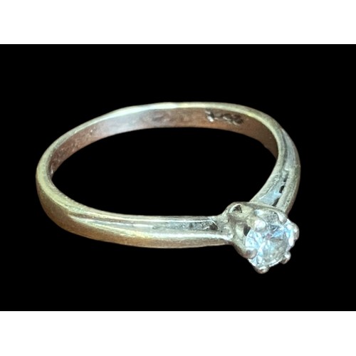 540 - A HIGH SET 9CT WHITE GOLD SOLITAIRE RING