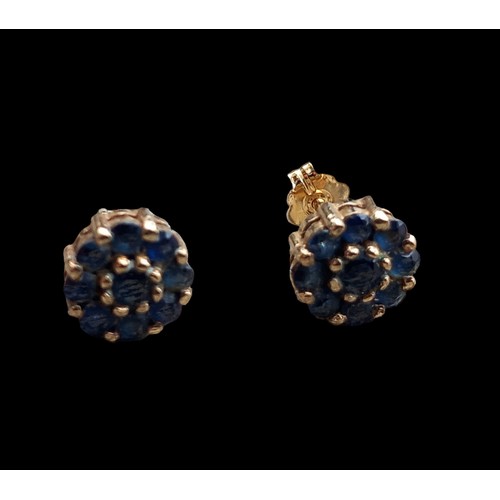 547 - 9ct YELLOW GOLD EARRINGS SET WITH 9 SAPPHIRES IN A FLOWER DESIGN