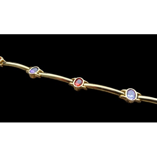 591 - 9ct GOLD BRACELET SET WITH 5 GEM STONES ALL OVAL SHAPED WITH 6 BARS BETWEEN EACH STONE WITH A TRIGGE... 