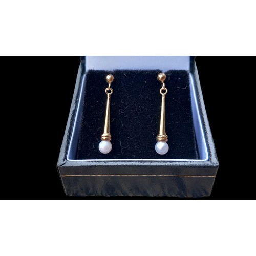 555 - 9ct YELLOW GOLD DROP EARRINGS WITH PEARL 1.28gms