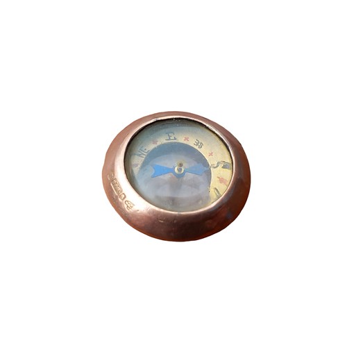 566 - SMALL DOUBLE SIDED COMPASS IN 9ct GOLD FRAME