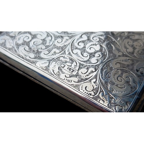 612 - A SILVER VICTORIAN CARD CASE DATED 1893 BY HILLIARD & THOMASON 79G