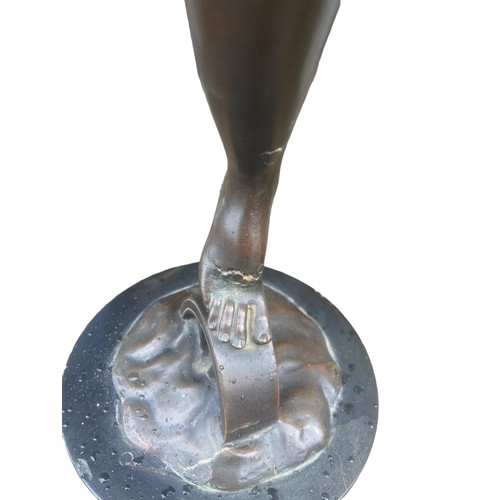 615 - A 19ct BRONZE LADY 27