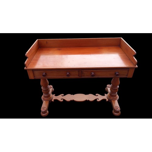 632 - A BEAUTIFUL VICTORIAN GALLERY BACKED TABLE WITH AN ORNATE STRECHER BASE