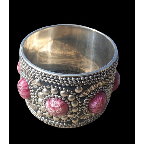 669 - AN ORNATE STONE SET CUFF BANGLE