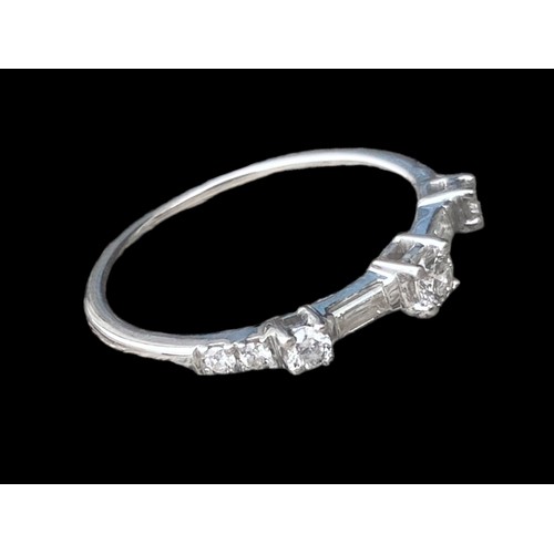 575A - 750k ETERNITY RING WITH 6 CUT DIAMONDS AND 2 BAGUETTE CUT DIAMONDS SIZE O 2.48gms