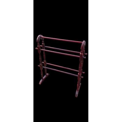 32 - A TOWEL RACK