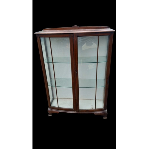 138 - A 2 DOOR DISPLAY/CHINA CABINET ON BRACKET FOOT