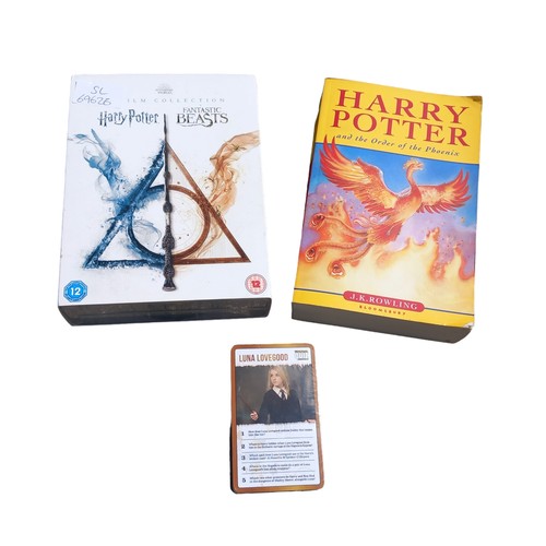 116 - A COLLECTION OF HARRY POTTER (BOOK , DVDs AND PLAYING CARDS)