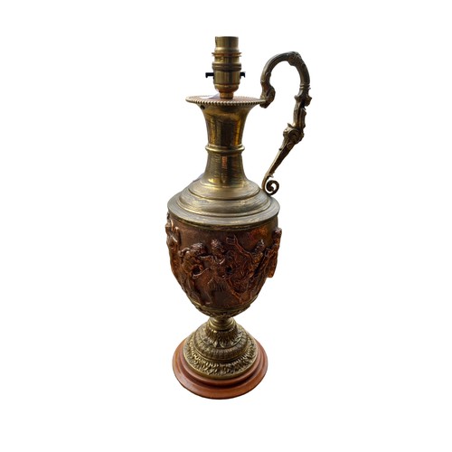 102 - AN ORNATE COPPER AND BRASS EWER WITH CONVERSION TO TABLE LAMP 18.5