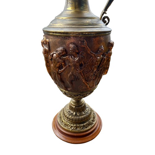 102 - AN ORNATE COPPER AND BRASS EWER WITH CONVERSION TO TABLE LAMP 18.5