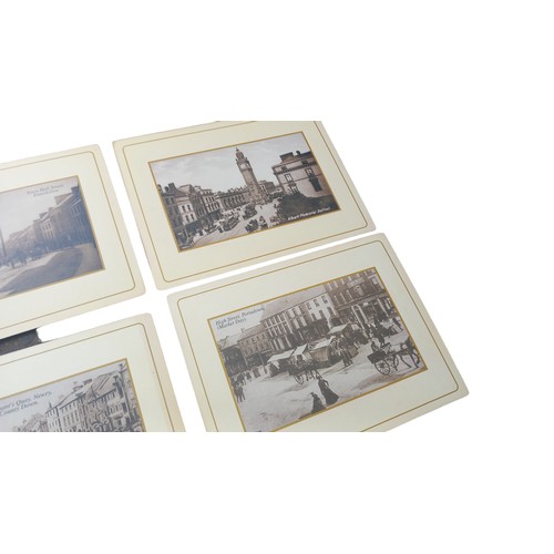 129 - A SET OF 6  BLACK AND WHITE PHOTO PLACEMATS