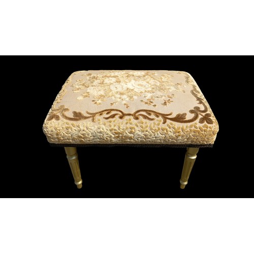 132 - A SMALL GILT LEGGED STOOL