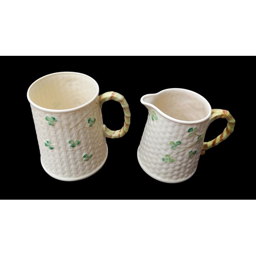 141 - A BELLEEK SHAMROCK MILK JUG & MUG