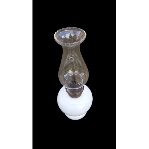 152 - A SMALL OPALINE OIL LAMP 10