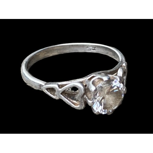 169 - A  SILVER SOLITAIRE RING WITH HEART SHANK