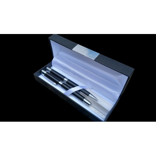 184 - A BOXED THIERY MUGLER PEN SET