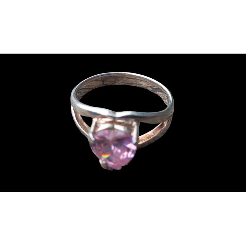 191 - A SILVER PINK HEART SHAPED RING