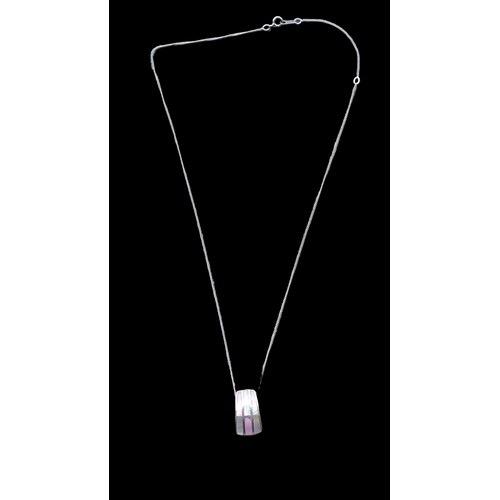 204 - A SILVER MOTHER OF PEARL PENDANT ON A SILVER CHAIN