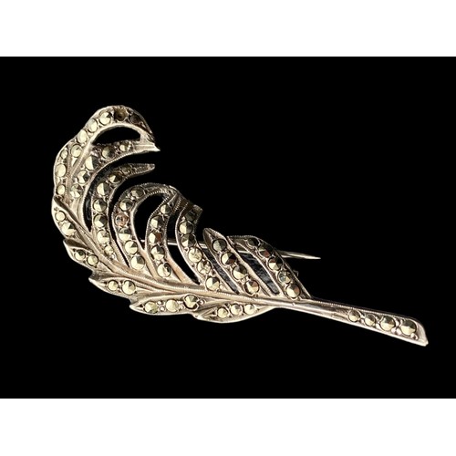 222 - A SILVER & MARCASITE FEATHER BROOCH