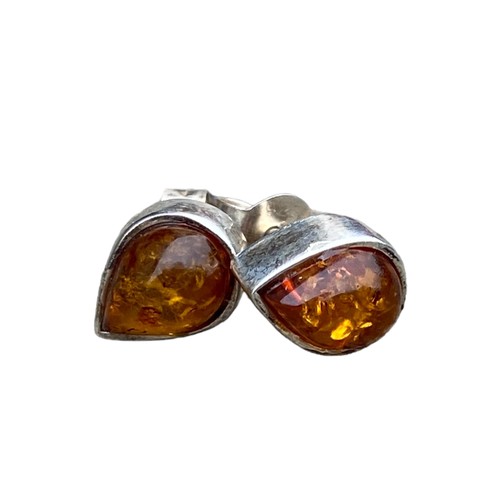 223 - A PAIR OF SILVER TEARDROP EARRINGS SET WITH AMBER STONES