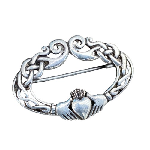 230 - A SILVER CELTIC BROOCH