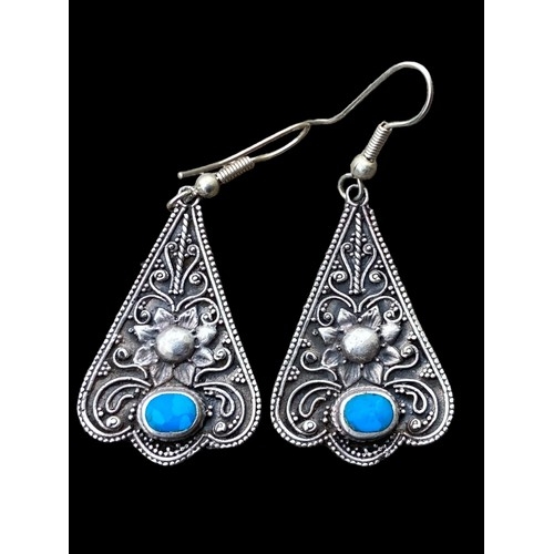 235 - A PAIR OF LARGE ORNATE SILVER EARRINGS SET WITH TURQOUISE