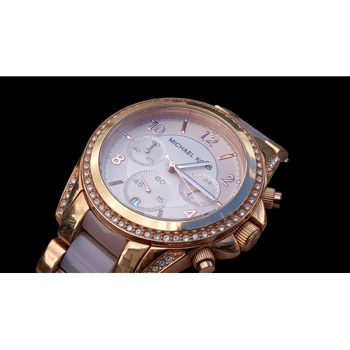 243 - A BOXED MICHAEL KORS WATCH